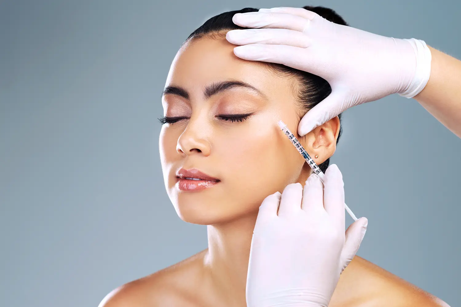 Woman receiving cosmetic injection