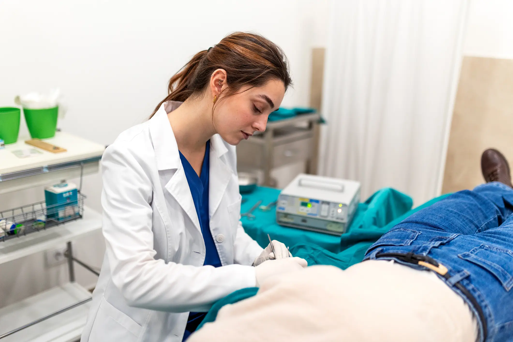Medical professional assessing patient