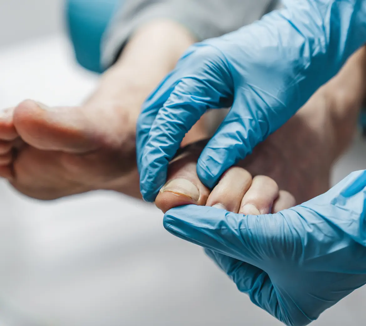 Podiatrist checking patient's foot